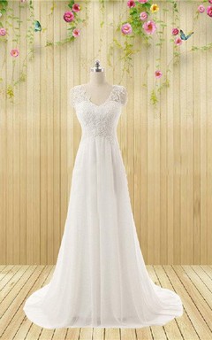 Robe de mariée sans manches à décolleté en V ornée de strass appliqués