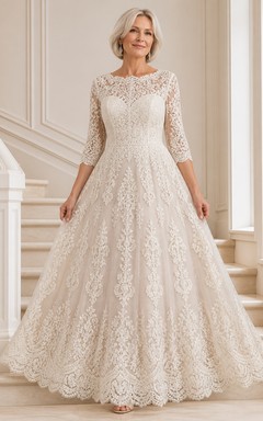 Vestido de novia de encaje con mangas tres cuartos y corte en A para novias mayores y recatadas.