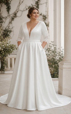 Robe de mariée élégante en satin à manches longues et décolleté plongeant, coupe trapèze