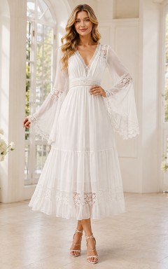 Robe de mariée bohème en mousseline de soie, col en V, manches cloche, coupe trapèze, longueur cheville, style jardin.