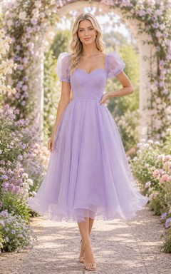 Robe midi trapèze à manches bouffantes et décolleté cœur en organza lavande