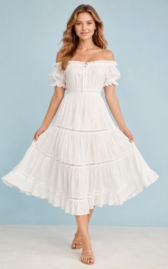 Robe mi-longue en mousseline blanche à épaules dénudées, manches bouffantes et volants