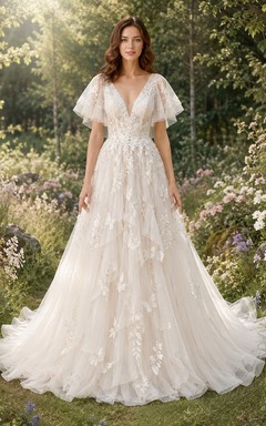 Vestido de novia de corte A con escote pronunciado y mangas acampanadas de la colección Jardín Encantado