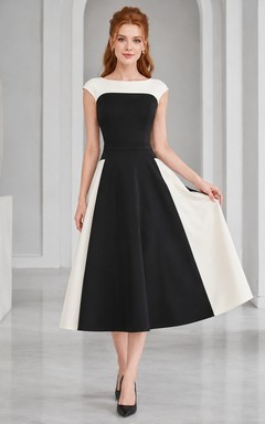 Schwarzes Vintage-Abendkleid in Teelänge mit weißen Flügelärmeln und A-Linien-Schnitt