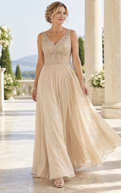 Vestido de noche largo hasta el suelo, de gasa, con escote en V, sin mangas, bordado de encaje y color champán.