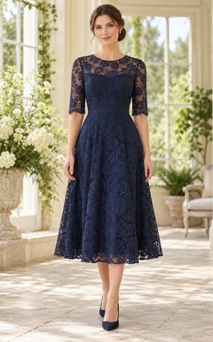 Robe d'invitée bleu marine foncé, sobre, en dentelle, manches coudes, coupe trapèze, longueur thé