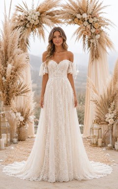 Robe de mariée bohème trapèze, épaules dénudées, décolleté cœur, tulle et dentelle appliqués, longueur au sol, traîne chapelle, ivoire