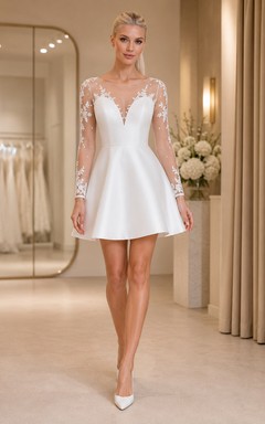 Robe de mariée courte en dentelle à manches longues et col en V