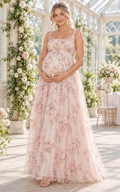 Ärmelloses, bodenlanges Umstandskleid mit Blumenmuster in zartem Rosa und Empire-Trägern
