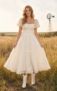 Robe de mariée occidentale en dentelle mi-longue avec manches bouffantes