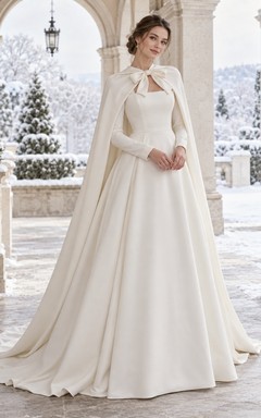 Vestido de novia sencillo de corte A con cuello abierto, lazo y mangas largas, ideal para invierno.
