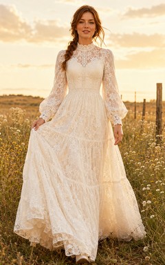 Vestido de novia bohemio de manga larga con encaje y volantes