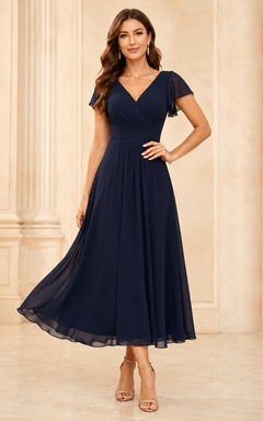 Vestido de noche formal largo hasta los tobillos, de gasa plisada, con escote en V, mangas tipo pétalo y cuello en V, color azul marino oscuro.