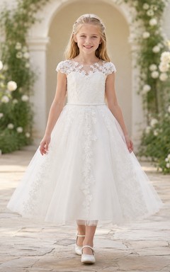 Vestido de niña de las flores para la Primera Comunión, de largo midi, con encaje transparente y mangas cortas.