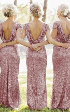 Vestido largo ajustado con mangas cortas y lentejuelas por toda la prenda.