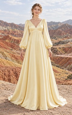 Vestido de novia sencillo de satén con escote en V y mangas largas estilo imperio, color narciso.