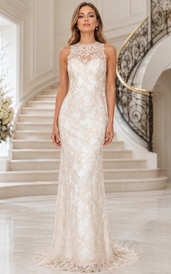 Vestido de novia de lujo sin mangas con escote joya y cola de sirena con encaje y cuello joya.