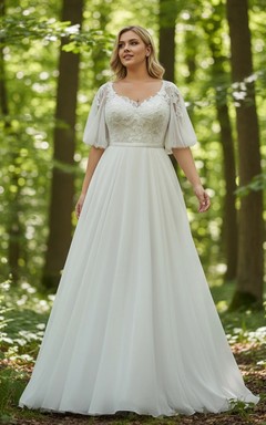 Vestido de novia de talla grande con escote en V de encaje, mangas abullonadas transparentes y falda en línea A.