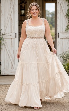 Vestido de novia bohemio de encaje y tul, corte en A, escote cuadrado, sin mangas y cola larga.
