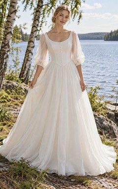 Vestido de novia vintage de organza con corte en A, escote redondo y mangas abullonadas transparentes.