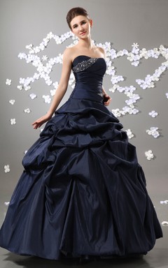 Robe de bal bustier en taffetas à volants et perles