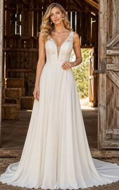 Vestido de novia bohemio de gasa y encaje, corte en A, escote en V, sin mangas, con cola larga.