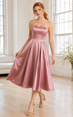 Robe midi romantique en satin rose poudré sans bretelles, coupe trapèze, longueur thé