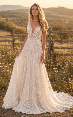 Vestido de novia de tul y encaje campestre, corte en A, tirantes finos, cola capilla, espalda baja en V.