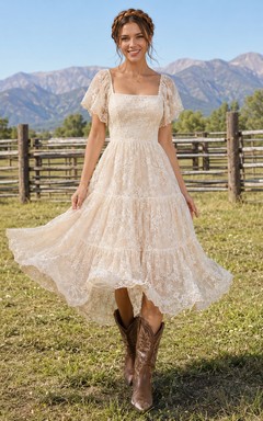 Robe de mariée de maternité, col V, bretelles spaghetti, coupe trapèze, en tulle, style plage, ornée de dentelle à la taille.