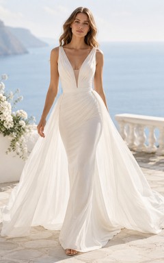 Vestido de novia de corte A con escote en V profundo, corpiño de encaje y falda de tul suave.