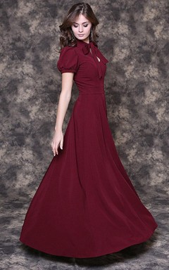 Langes Jerseykleid in A-Linie mit Schleifenkragen, Puffärmeln und Schlüssellochausschnitt