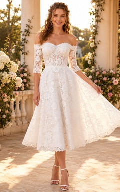 Robe de mariée romantique vintage en dentelle, coupe trapèze, épaules dénudées, manches courtes, épaules dénudées, longueur thé, idéale pour renouveler ses vœux.