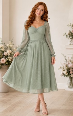 Vestido formal bohemio de gasa de manga larga con escote en V y corte en A, color verde salvia, largo hasta la rodilla.