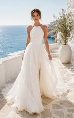 Vestido de novia de tul con escote halter y corte en A con abertura
