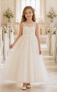 Vestido de niña de flores de tul hasta la rodilla con corpiño de encaje ilusión color marfil y encaje transparente.