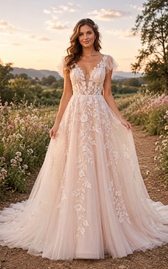 Vestido de novia de corte A con apliques en rosa empolvado y cola de tul