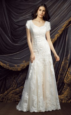 Vestido de novia de corte A con encaje y mangas cortas