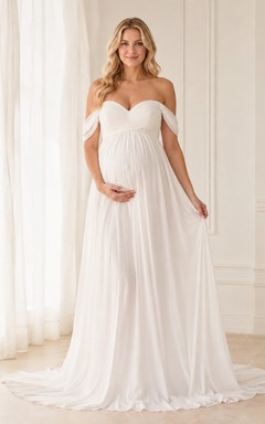 Vestido de maternidad romántico blanco de gasa con escote corazón, hombros descubiertos y corte imperio con cola.