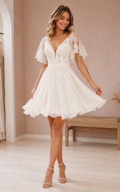 Vestido de novia bohemio corto de gasa con escote en V, encaje y mangas con volantes para la playa