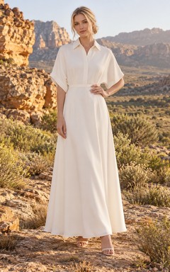 Vestido de novia sencillo e informal de gasa con cuello, manga corta y corte en A, cintura lisa.
