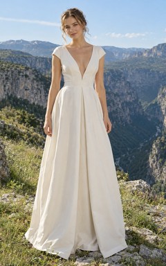 Vestido de novia sencillo, largo hasta el suelo, con escote en V pronunciado, mangas cortas y pliegues, corte en A.