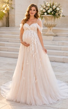 Vestido de novia premamá rosa rubor con hombros descubiertos y apliques florales