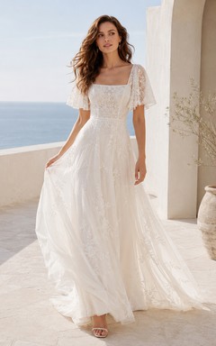 Robe de mariée bohème à col carré, manches courtes en dentelle, coupe trapèze et longueur au sol