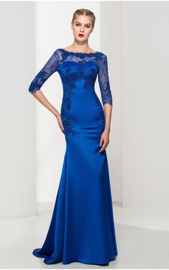 Elegante vestido de satén y tul estilo sirena con escote barco y mangas cortas y espalda en V.