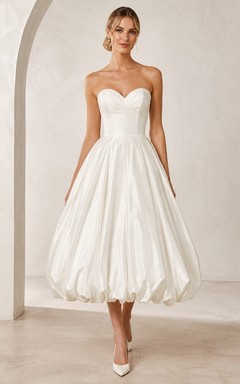 Vestido de novia vintage de corte A con escote corazón y falda abullonada, largo hasta la rodilla
