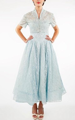 Robe en dentelle à bretelles avec veste et boléro