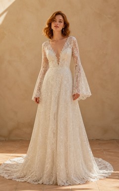 Vestido de novia bohemio de corte A con escote en V y mangas largas hasta el suelo.