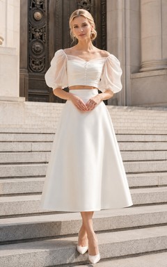 Conjunto nupcial de organza con top corto de manga abullonada y largo hasta la rodilla, estilo juzgado.