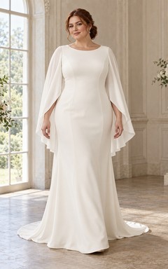 Vestido de novia de corte recto con escote redondo discreto, mangas largas tipo capa y cola larga.