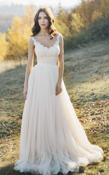 Sleeveless Tulle Illusion Bateau Neck Wedding Dress With Lace Detailed Top And Illusion Back
